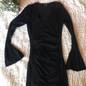 Black bodycon dress with bell sleeves